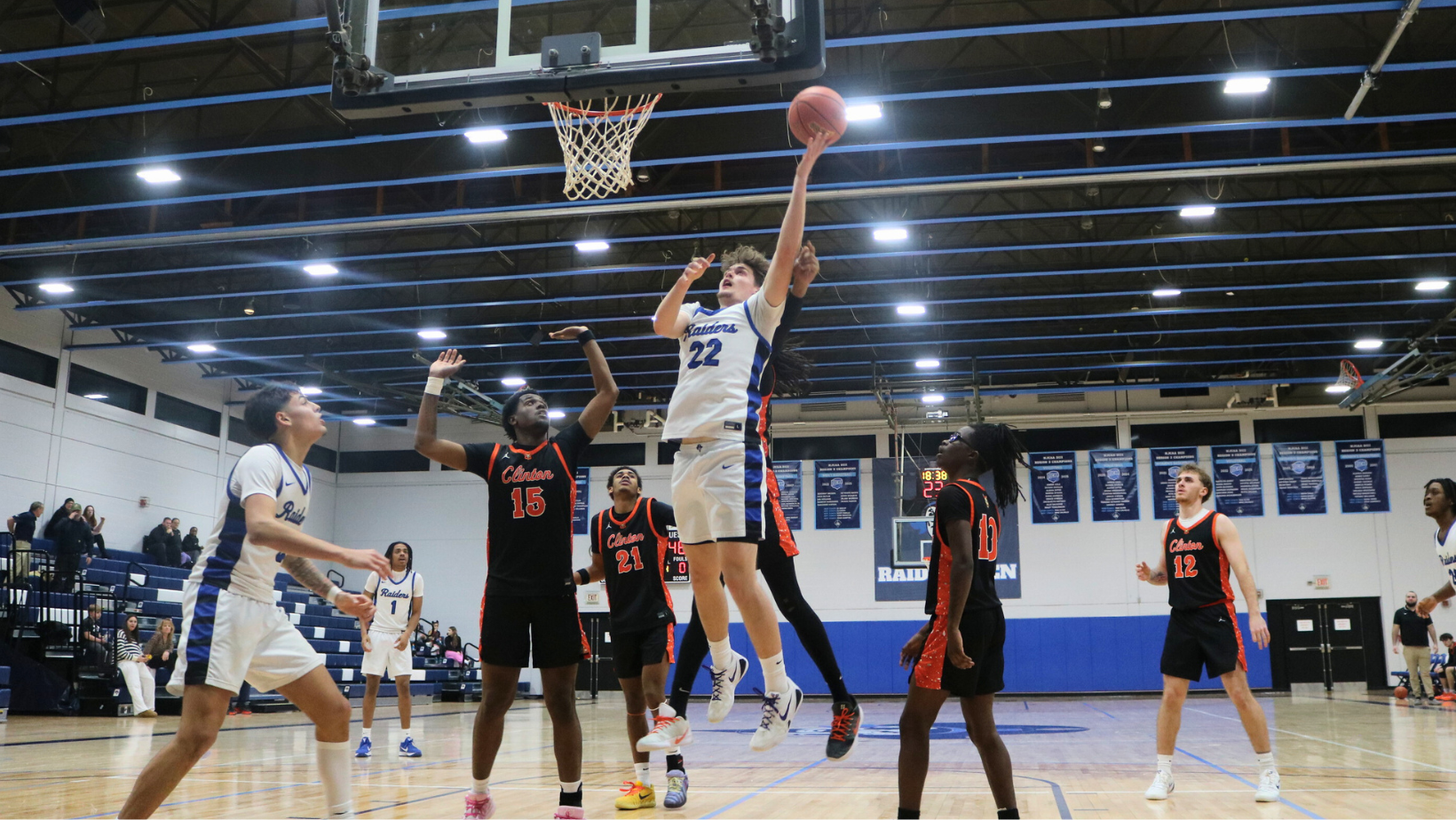 Brady Smith attacks the rim for 2 of his 14 points.