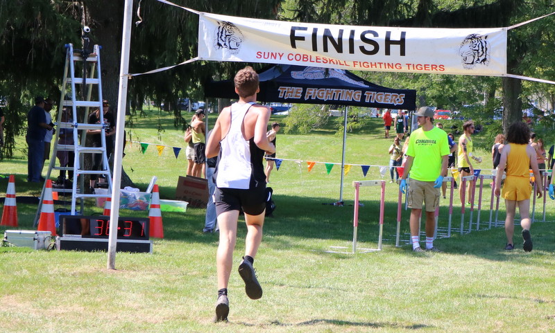 Aiden Monroe Crosses the Finish Line.